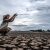 A woman is sitting asking for rain in the dry season,global warming
